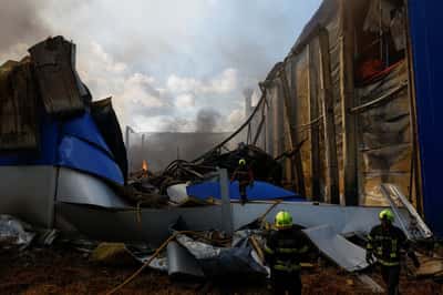 Image for Smoke rises in central Kyiv after Russian drone attack