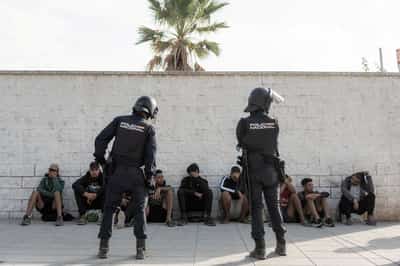 Image for Spain orders probe after rights group alleges troops abused migrants in Ceuta