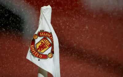 Image for Shut stadium pushes Manchester United to third-quarter loss