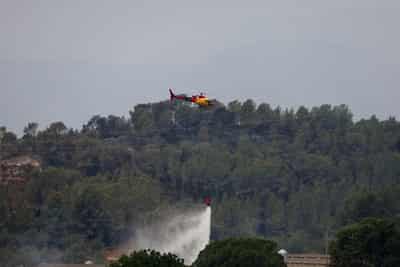 Image for More than 18,000 people in lockdown as wildfire rages in Catalonia