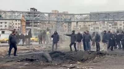 Image for Combatants in Mideast war trade more air strikes as Iran clamps down on dissent