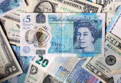Image for Sterling dips as oil rises, still set for weekly gain on hawkish BoE