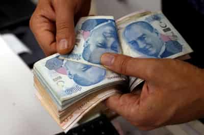 Image for Analysis: Foreigners suspend disbelief, edge back into Turkish markets