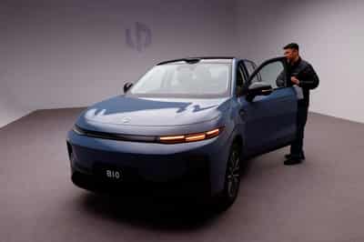 Image for China flexes its auto-safety chops with huge recall of Tesla, other cars