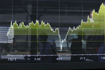 Image for Stocks hit record high on tech lift as Fed, earnings eyed