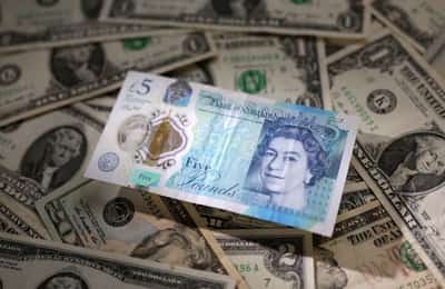 Image for Sterling nudges higher against dollar, inflation data in focus