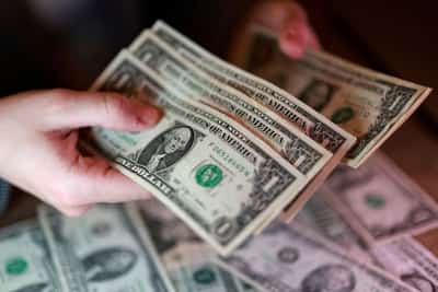 Image for Dollar sways near 10-day lows as attention turns to BOJ and RBA