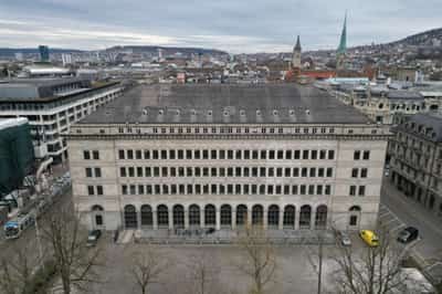 Image for Swiss National Bank raises rates, says bank crisis stopped
