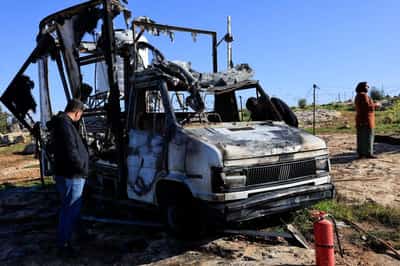 Image for Israeli settlers burn tents, vehicles in West Bank village, say residents