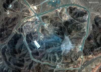 Image for Iran fires missiles at US base in Qatar, Trump calls for peace