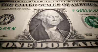 Image for Dollar falls as risk appetite improves, sterling dips on BoE