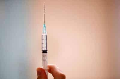 Image for Ignoring WHO call, major nations stick to vaccine booster plans