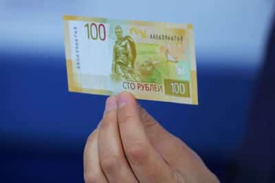 Image for Volatile rouble gains, Russian stocks steady as oil prices hit low