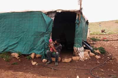 Image for Palestinian man says Israeli settlers sexually assaulted him in front of his family