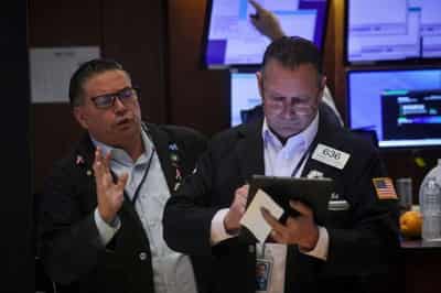 Image for World shares edge up as Fed pause bets bolster sentiment
