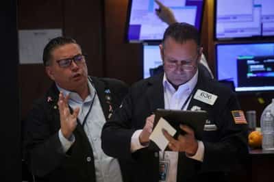 Image for World shares edge up as Fed pause bets bolster sentiment