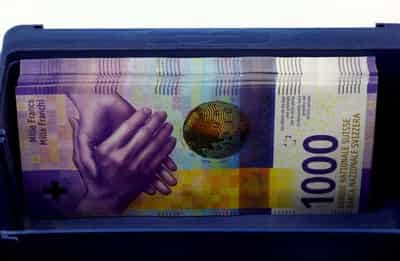 Image for Swiss central bank steps up policy tightening as sight deposits drop $78 billion
