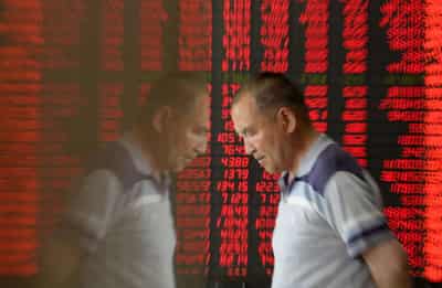 Image for Major U.S. index to remove more China stocks after Biden order