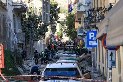 Image for Explosion fells building in heart of touristic Athens, three injured