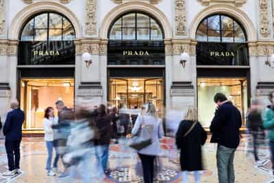 Image for After long courtship, Versace becomes part of Prada