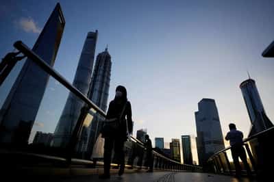 Image for Wall St rallies, dollar drops after cooler US inflation; Fed in the wings