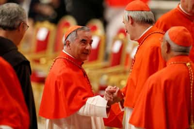 Image for Convicted cardinal wants to vote for pope, his brother prelates must decide