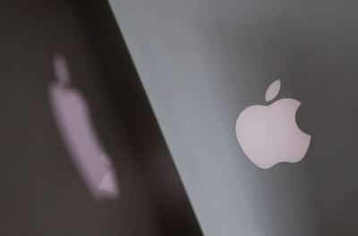 Image for Apple shows pricey touchscreen laptops, a first for the iPhone maker