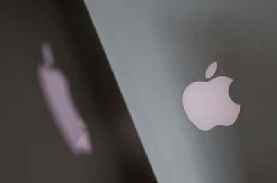 Image for Apple shows pricey touchscreen laptops, a first for the iPhone maker
