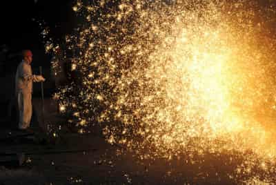 Image for China&#8217;s factory output slows as bottlenecks crimp production