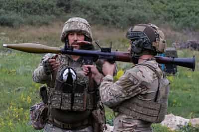 Image for Ukrainian troops doubt quick ceasefire, reject territorial concessions
