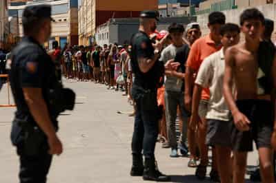 Image for Spain to establish border controls on travellers from Italy amid migration row