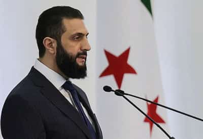 Image for France's Macron wants EU to end Syrian sanctions