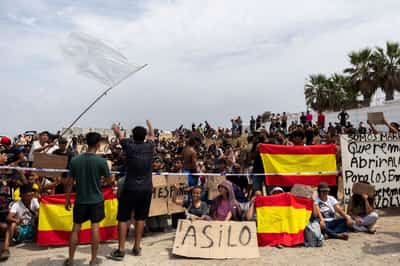 Image for In Spain's Ceuta, hundreds of migrants stage protest and demand asylum