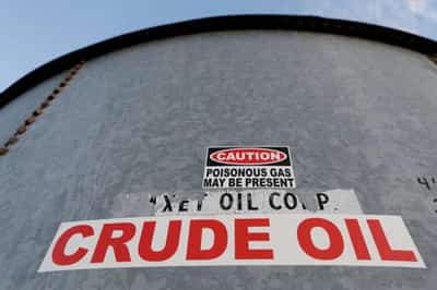 Image for Oil prices fall, weighed down by dollar, China lockdowns