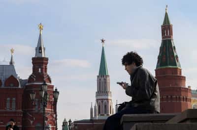 Image for Two phones and an app: How Russians skirt Putin's digital iron curtain