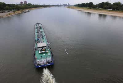 Image for Water levels on river Rhine in Germany rising after rain but vessels still part loaded