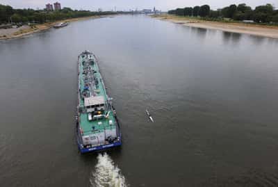 Image for Water levels on river Rhine in Germany rising after rain but vessels still part loaded
