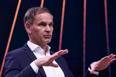 Image for Volkswagen CEO flags 50,000 extra job cuts to staff as costs squeezed