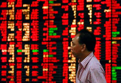 Image for Stocks slip, dollar up as data challenges Fed pause hopes