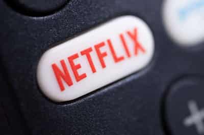 Image for Netflix cuts prices in some countries to boost subscriptions, shares drop