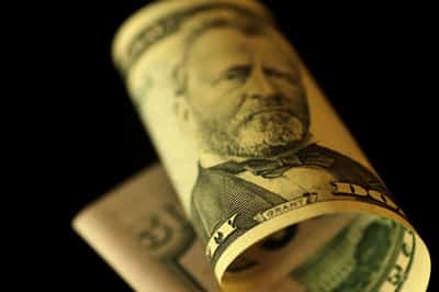 Image for Dollar drops versus euro and yen amid ongoing US-China trade friction