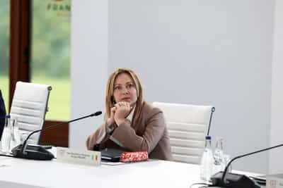 Image for Meloni fights back after Trump tells Italian TV she 'begged' for photo with him at G7