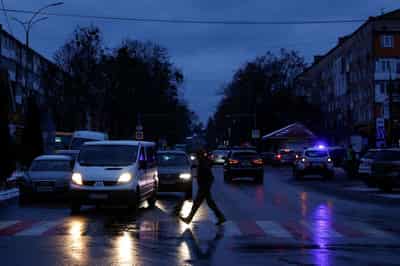 Image for Ukrainians withstand days-long power cuts in crowded 'resilience' shelters