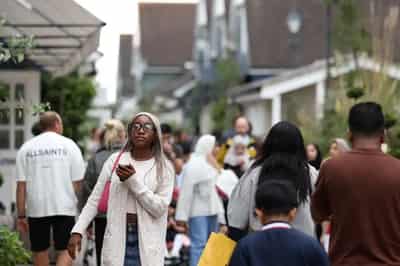 Image for UK shop prices dip for first time in nearly 3 years, survey shows