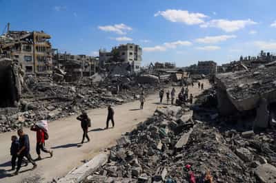 Image for Hamas hands over hostage bodies after Israel threatens aid cut
