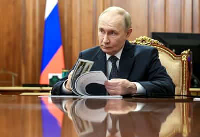 Image for Putin says Russia will take more land in Ukraine if Europe sinks peace moves
