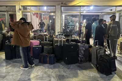 Image for Pakistanis fleeing Iran describe strikes shaking ground under their feet