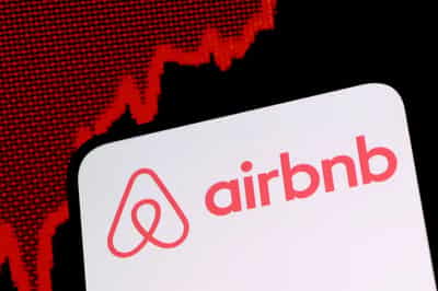 Image for Airbnb hits four-year high as investors cheer revenue forecast raise, AI payoff