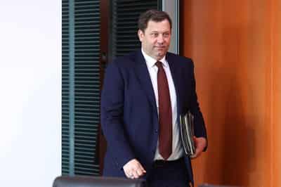Image for German minister eyes windfall tax on oil firms to ease high energy costs