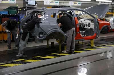 Image for UK manufacturing PMI slips to five-month low but hiring strengthens